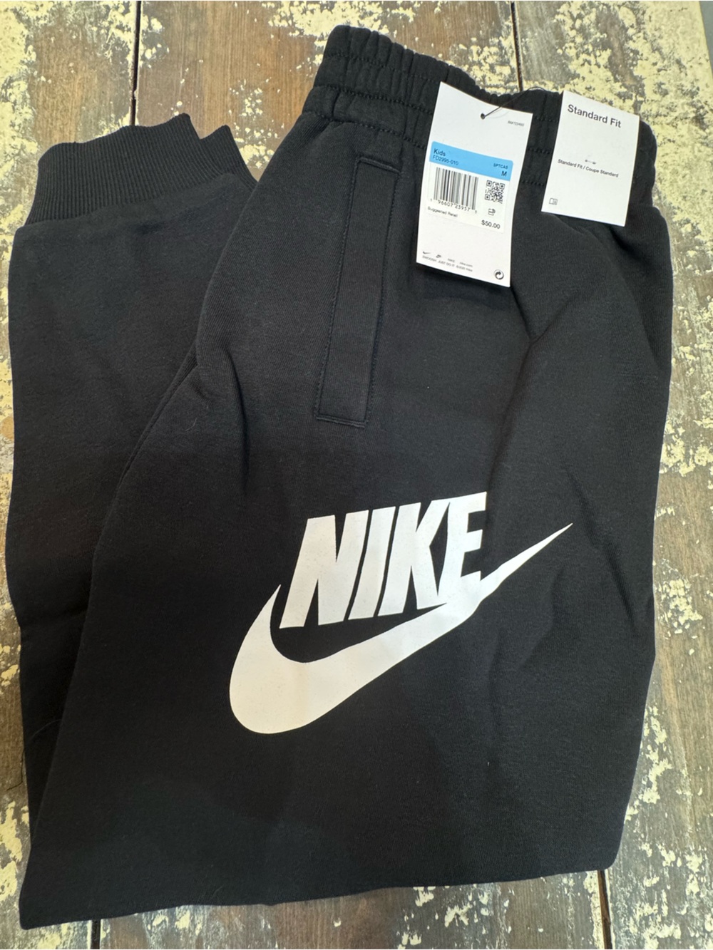 Nike Kids Black Sweatpants with White Logo